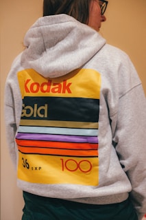 a person wearing a sweatshirt with a hoodie on
