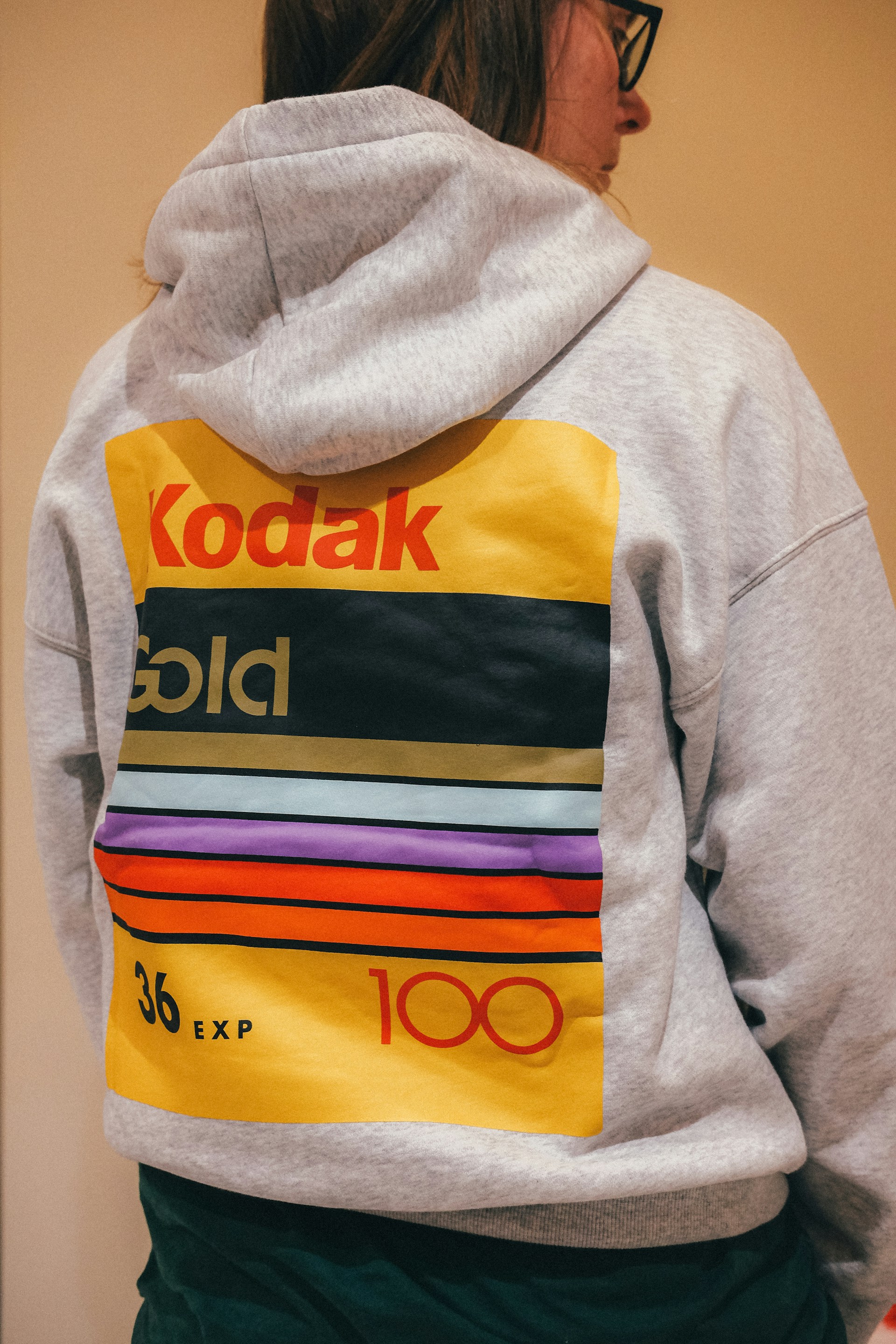 a person wearing a sweatshirt with a hoodie on