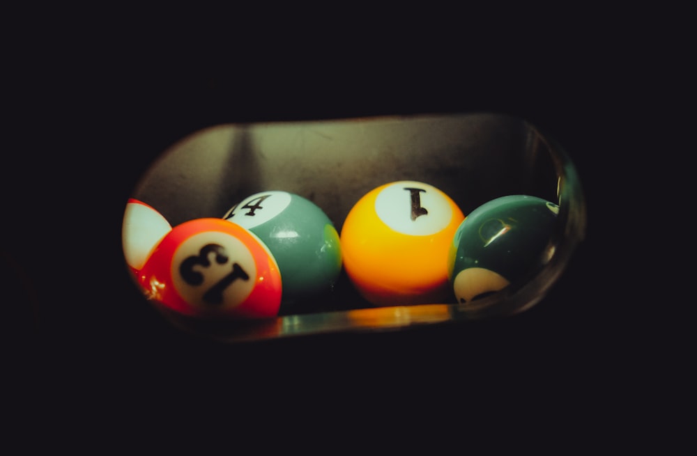 a pool table with pool balls in it