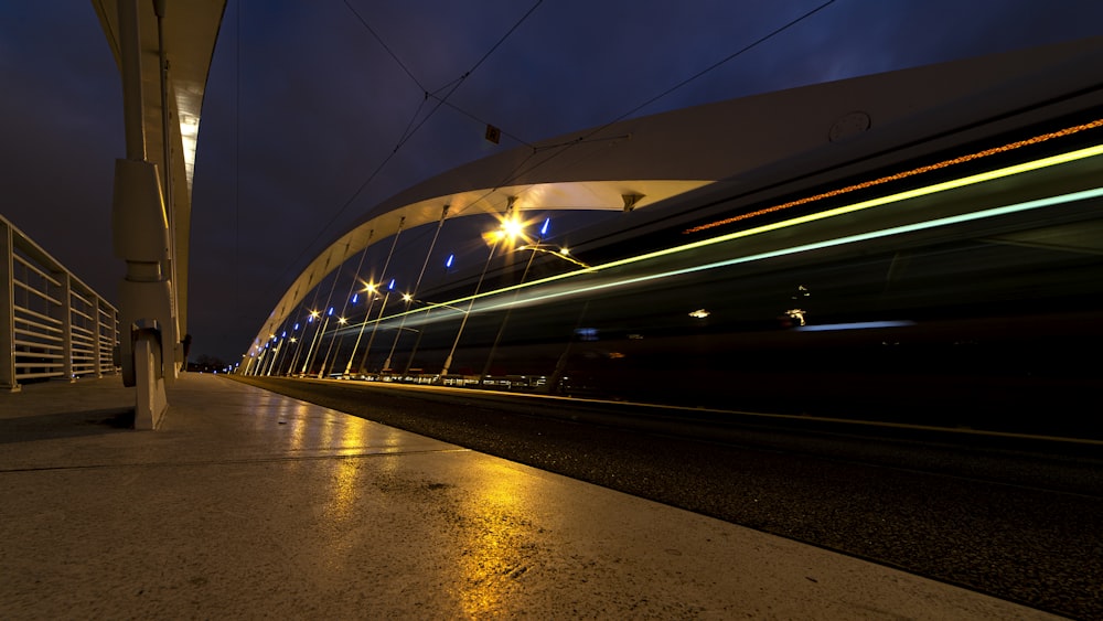 a long exposure photo of a train passing by