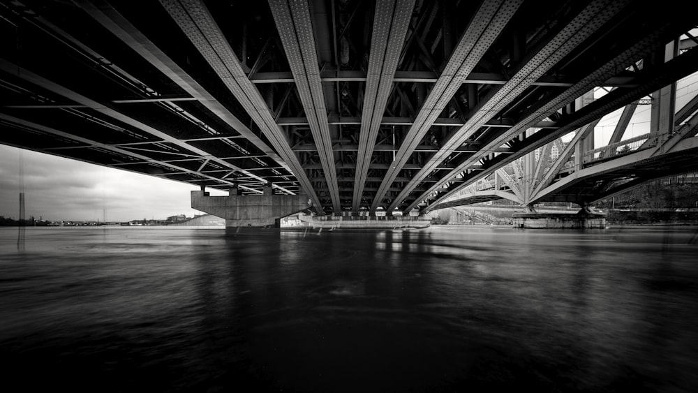 a black and white photo of a bridge