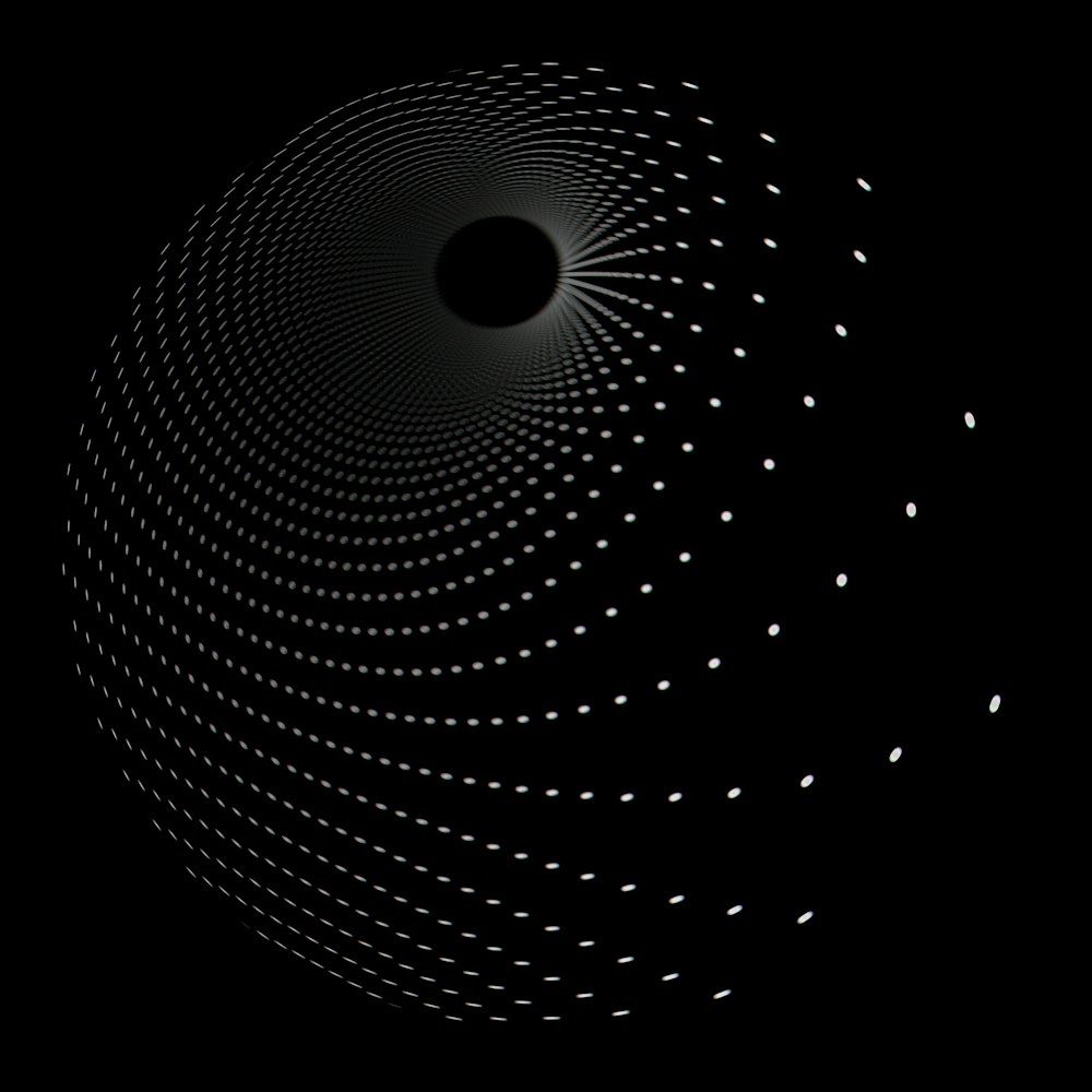 a black and white photo of a black hole