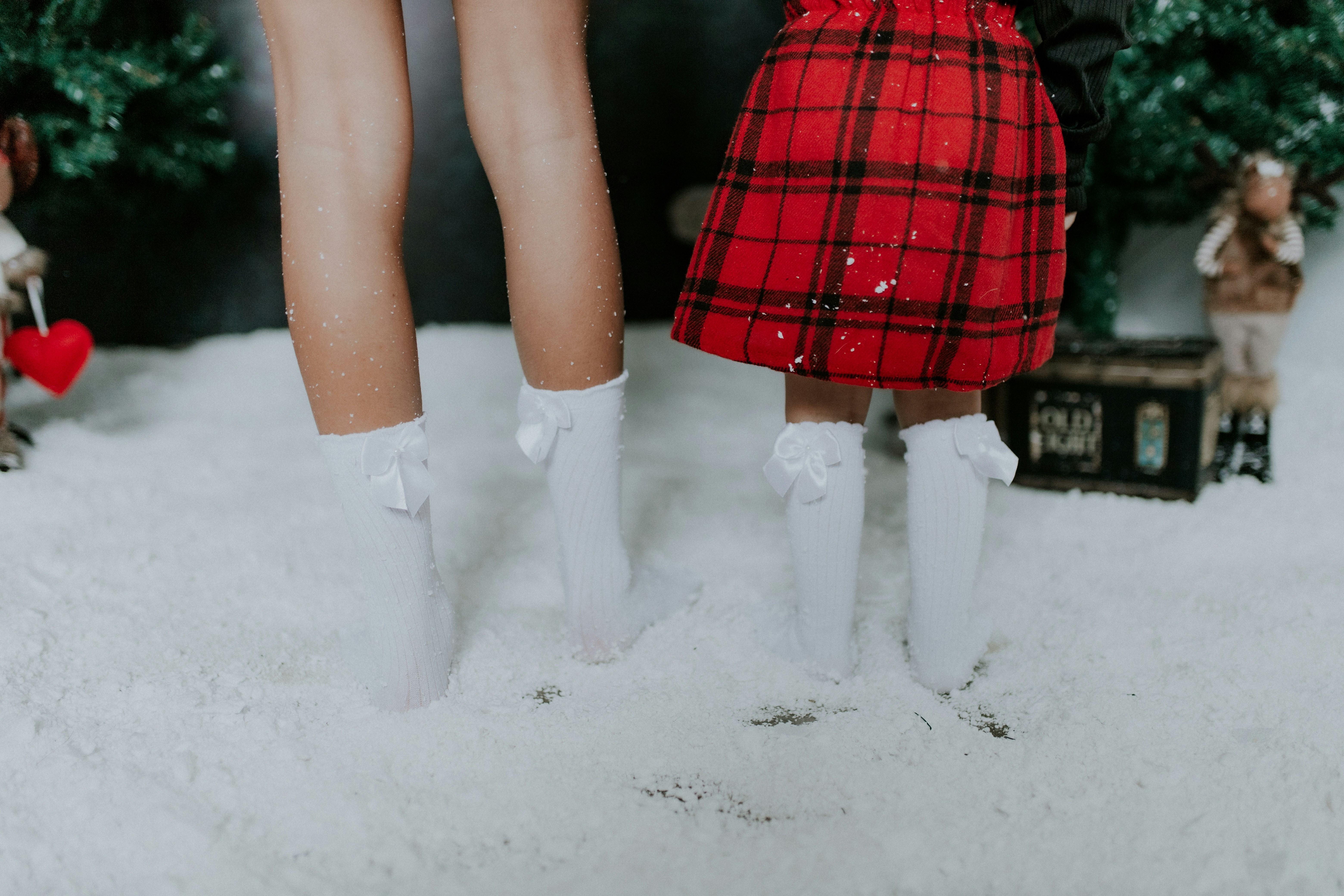 a couple of dolls standing next to each other