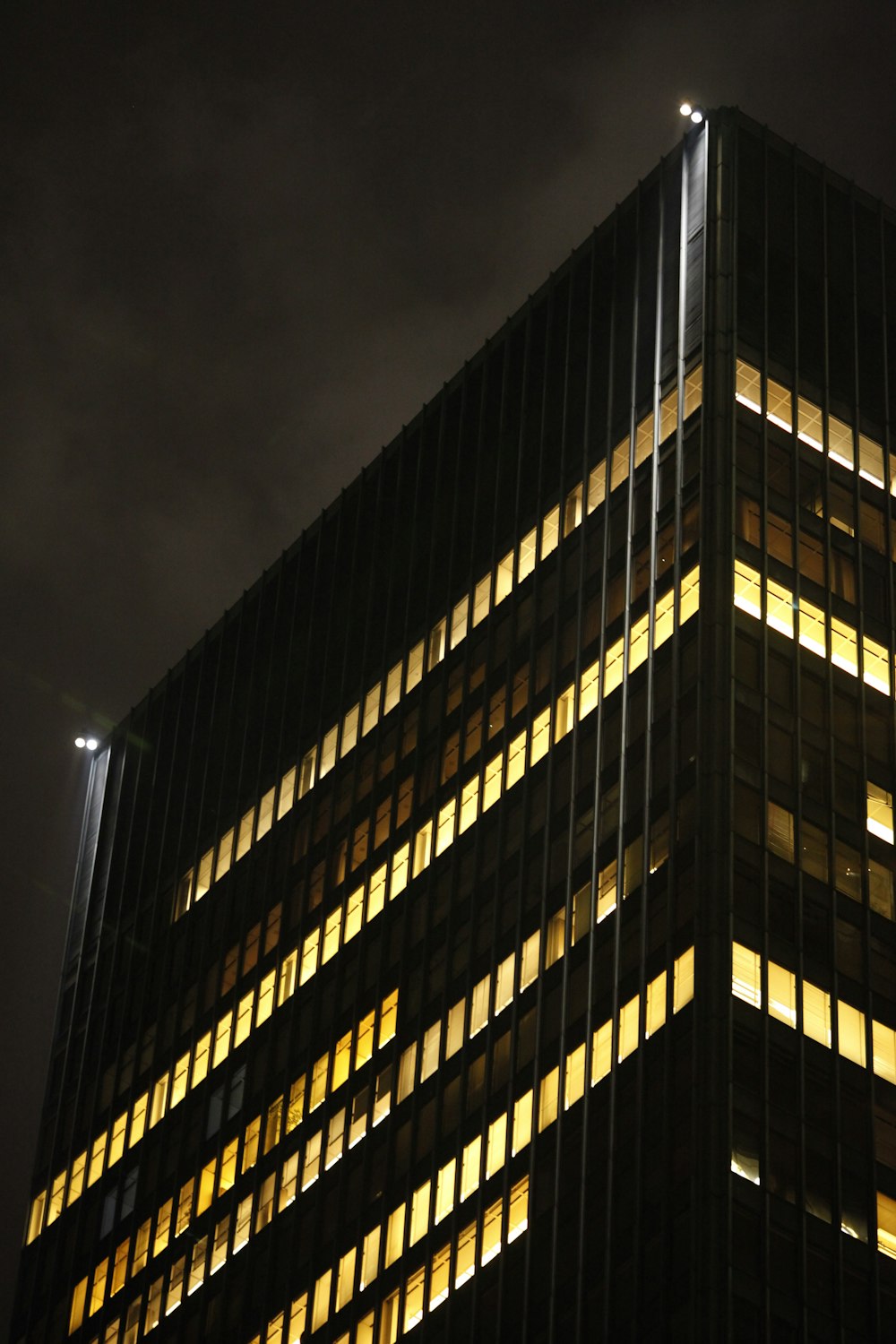 a very tall building lit up at night