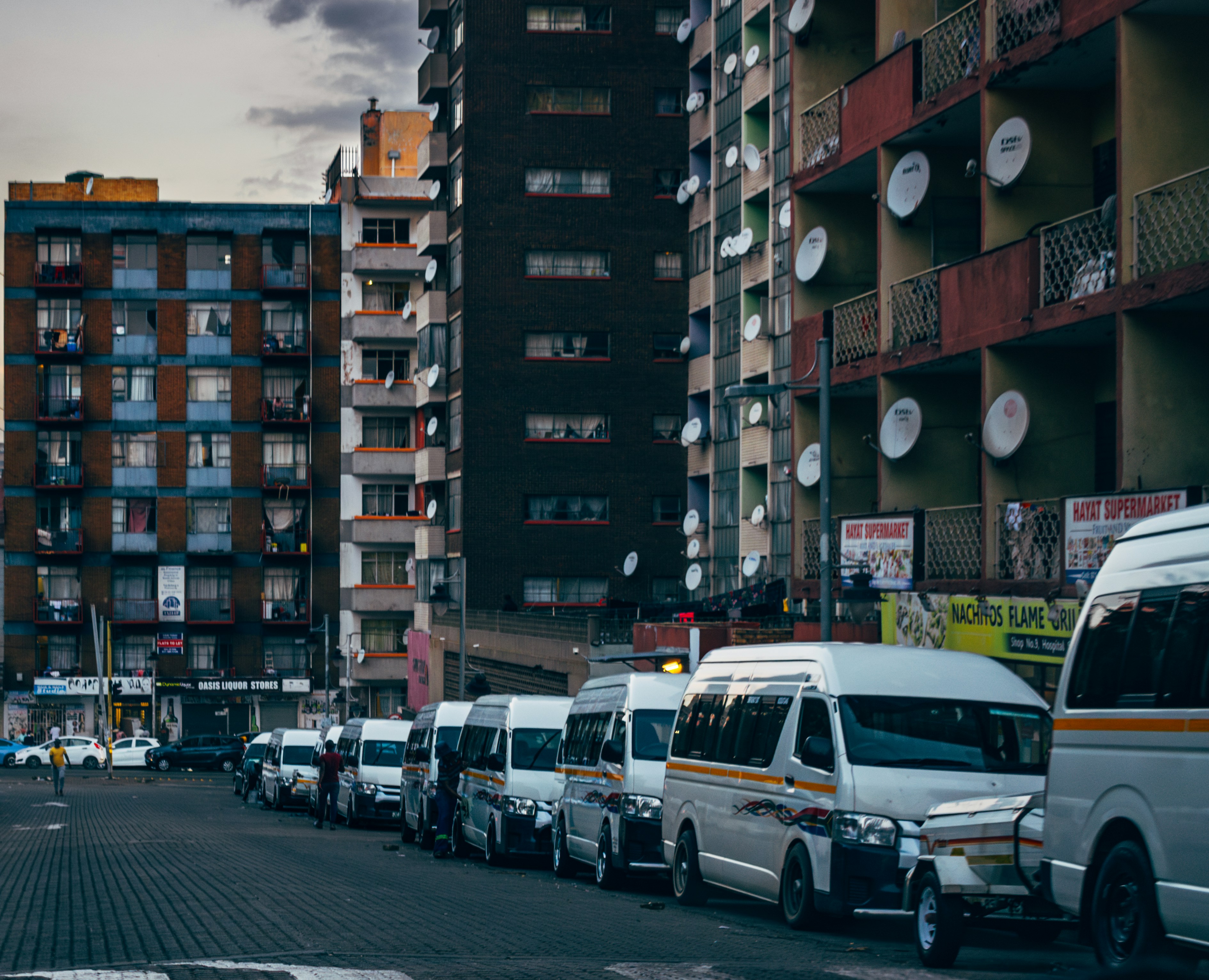 black and brown leather padded tub sofa