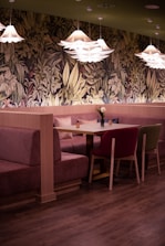 Cozy rustic dining area surrounded by nature with earth tone decor.