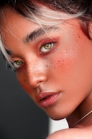 A close-up portrait showcasing natural light and vivid tones.