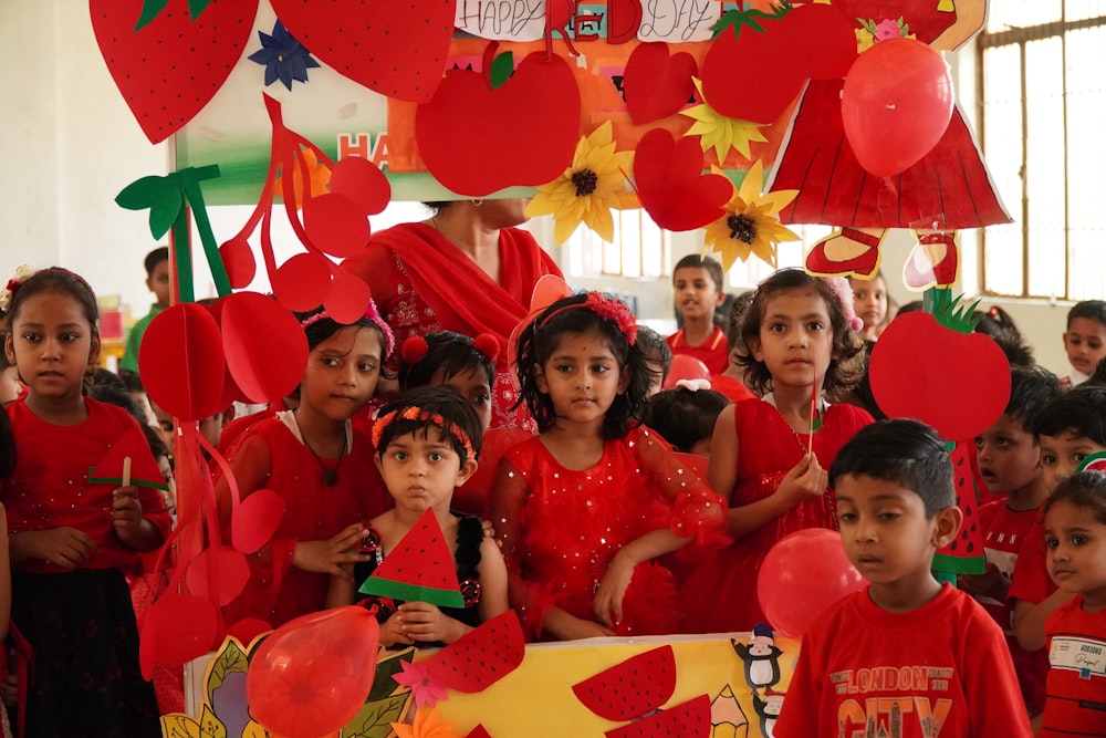 a group of children standing next to each other