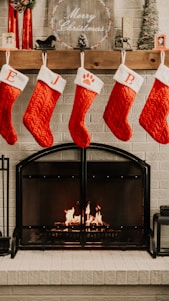 A cozy fireplace mantle with stockings hanging, each adorned with vibrant two-layered solid color tags.