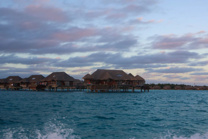 Maldives overwater villa deck turquoise water