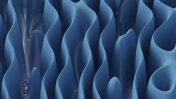 Acrylic surface with a glossy 3D printed ocean wave pattern that captures light beautifully.