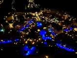 A luxury resort’s ambient lighting system controlled via IoT platform at dusk.