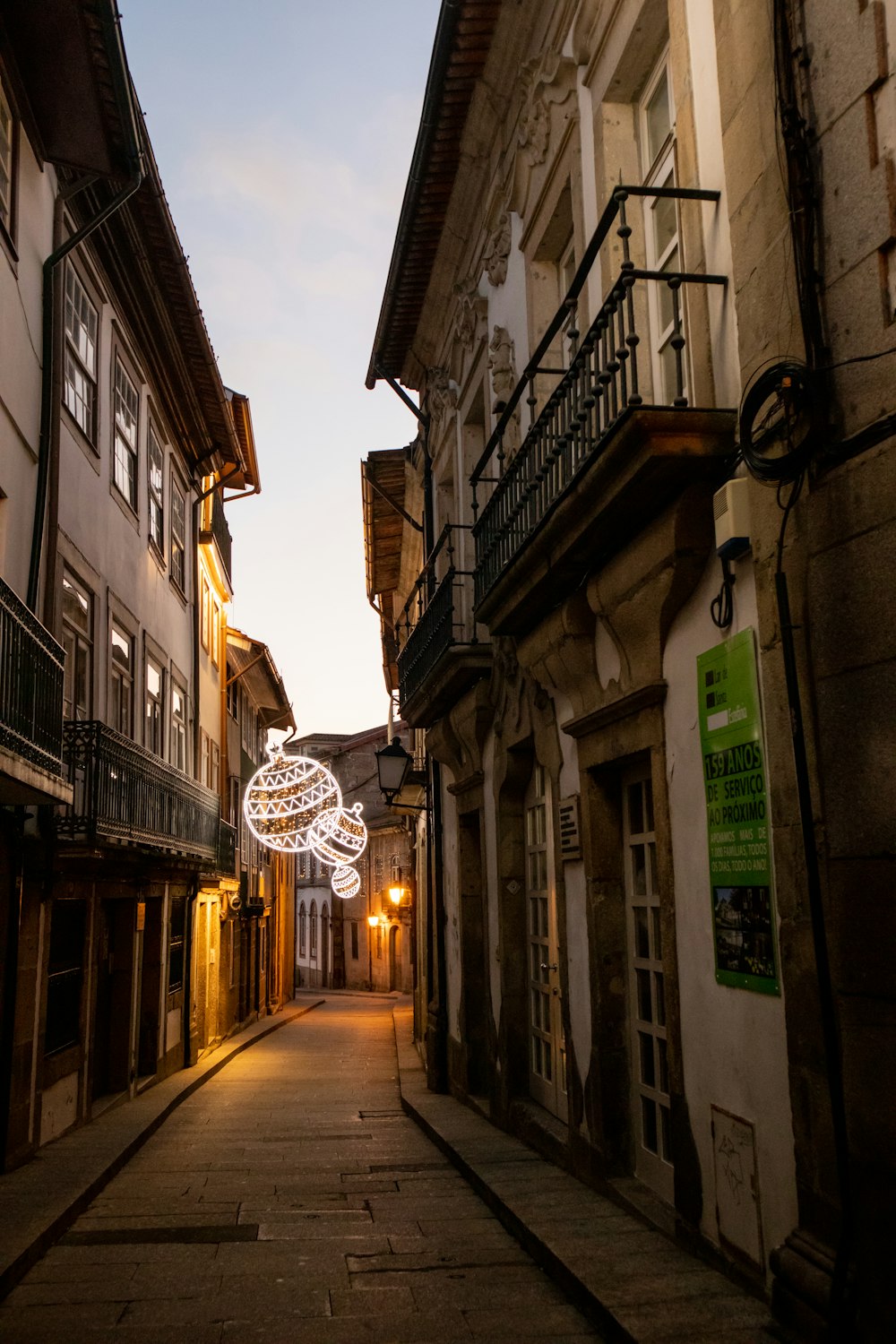 a street lined with tall buildings next to each other