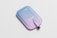 A sleek, modern water pouch features a gradient color scheme from blue to purple with white text labeling its specifications and brand name. The design is minimalist with a clean surface and a black spout.