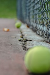 Close-up of a tennis match with AI camera setup tracking the action.