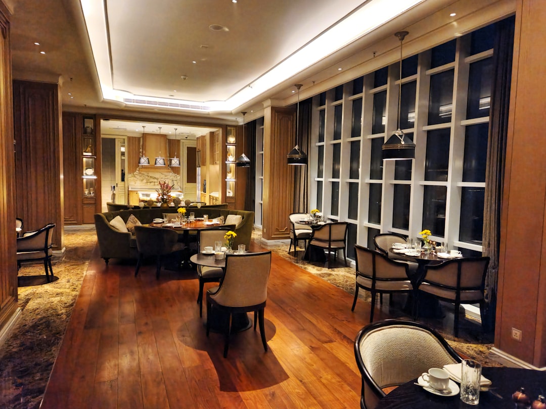a dining room with a lot of tables and chairs, The Lounge at the Ritz Carlton in Pune is a members exclusive club that s