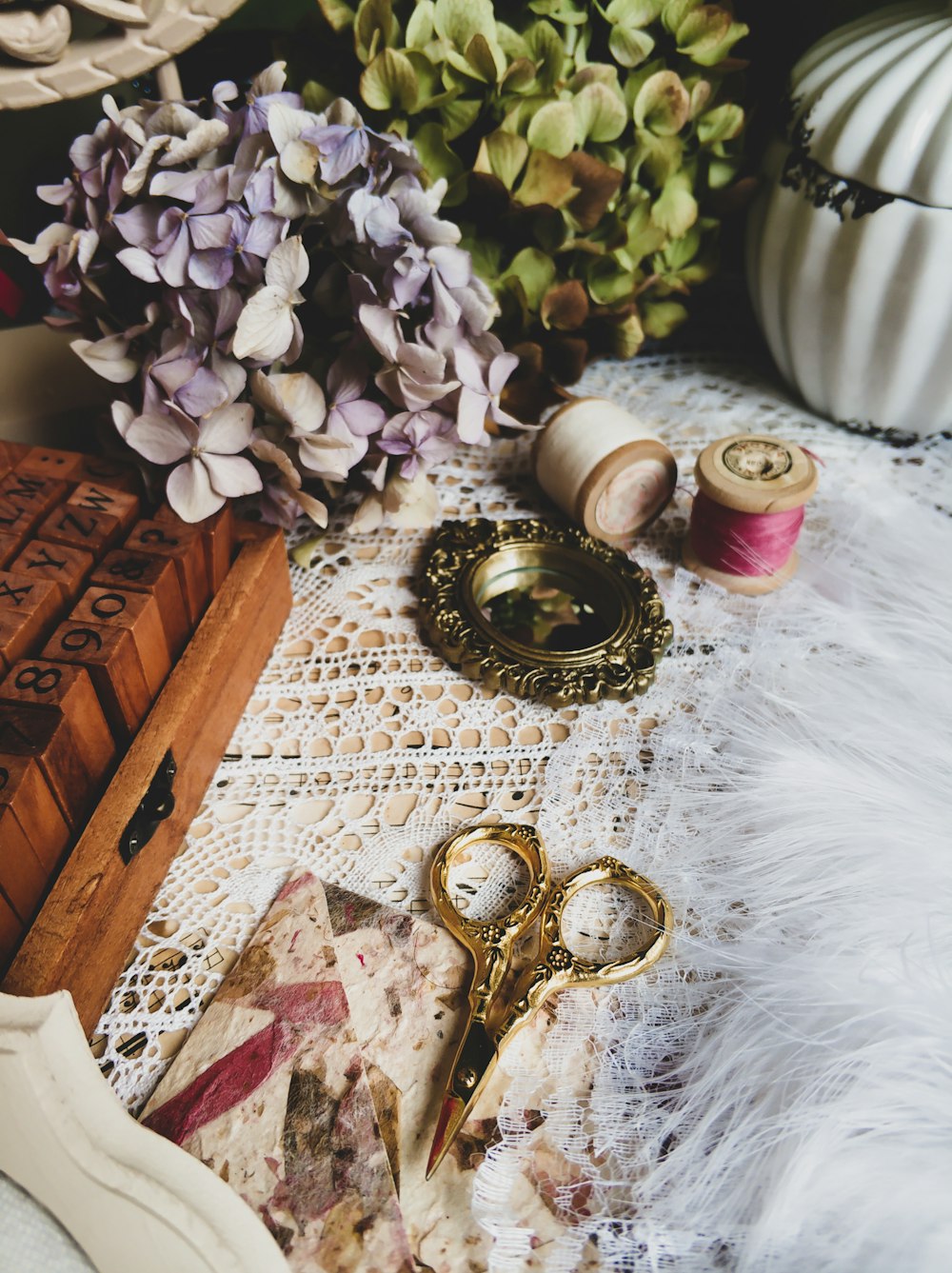 a table topped with lots of different types of flowers