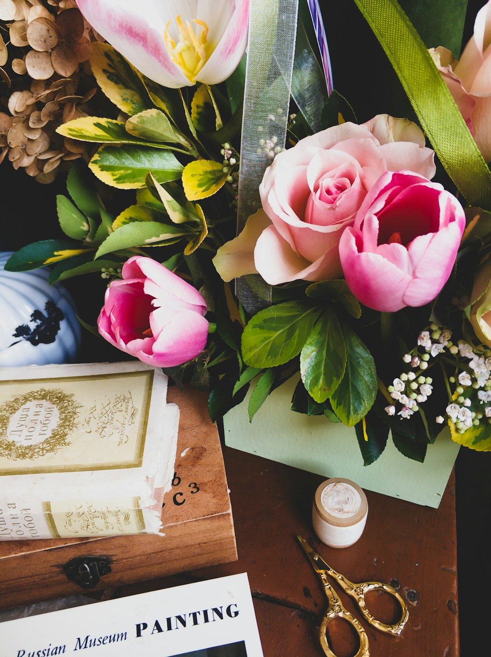 a bouquet of flowers sitting on top of a table