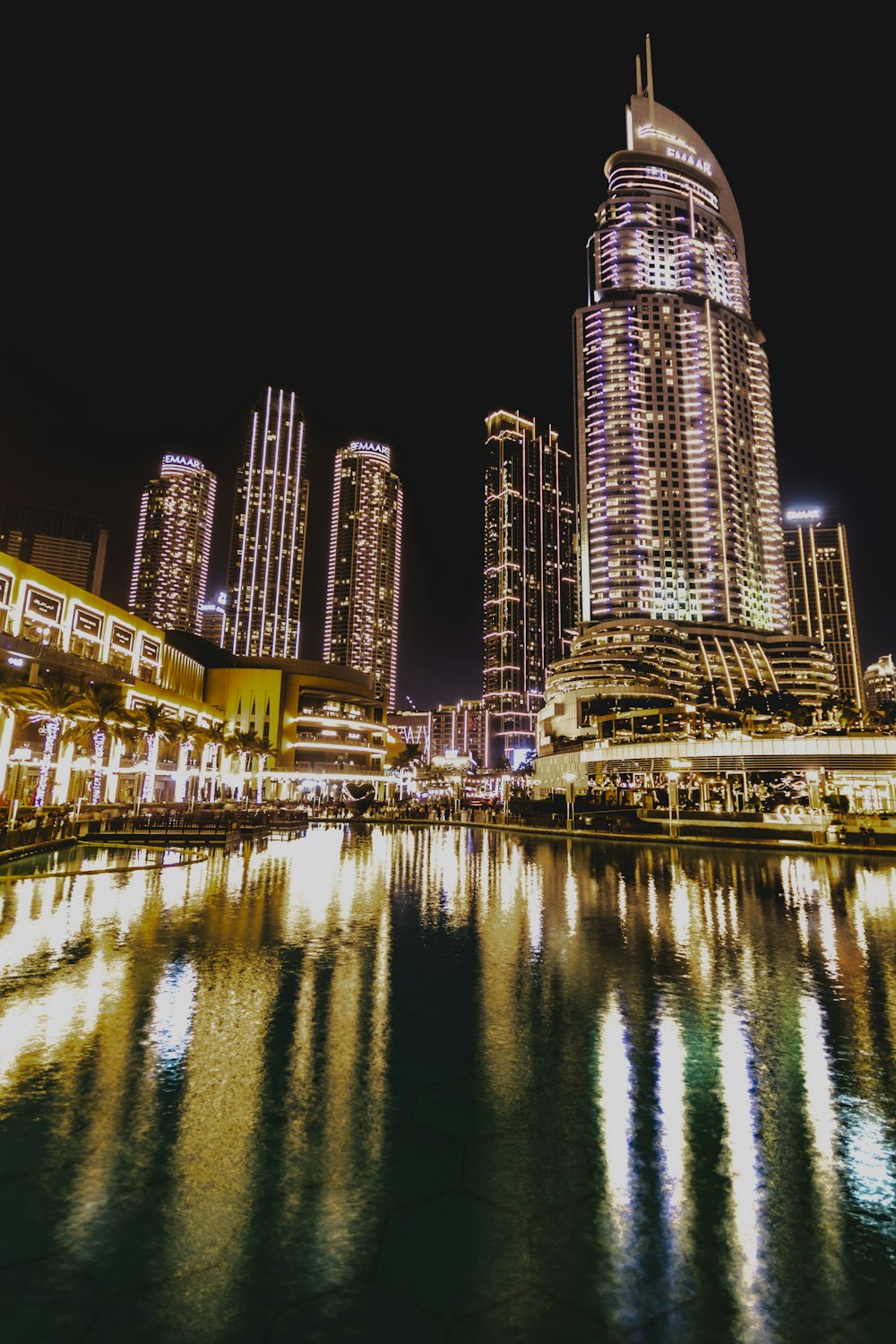 a large body of water surrounded by tall buildings