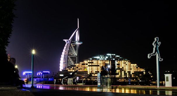 a night view of a city with tall buildings