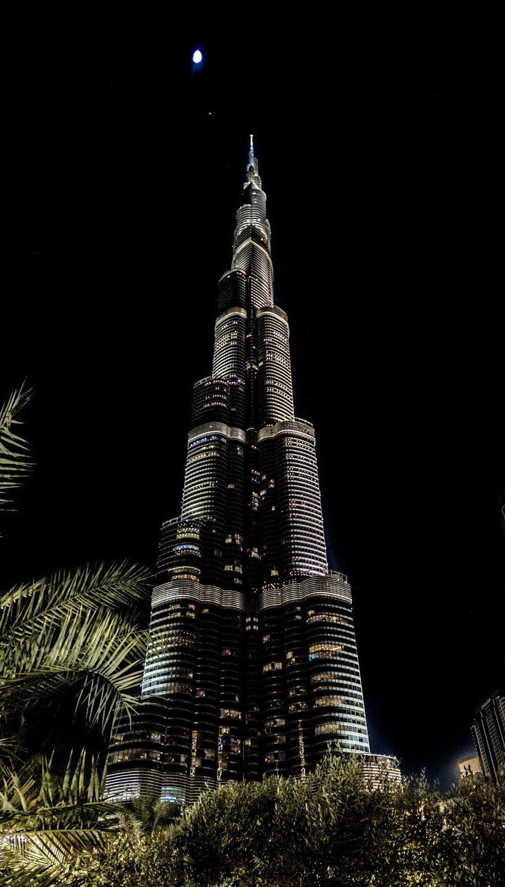 a very tall building lit up at night