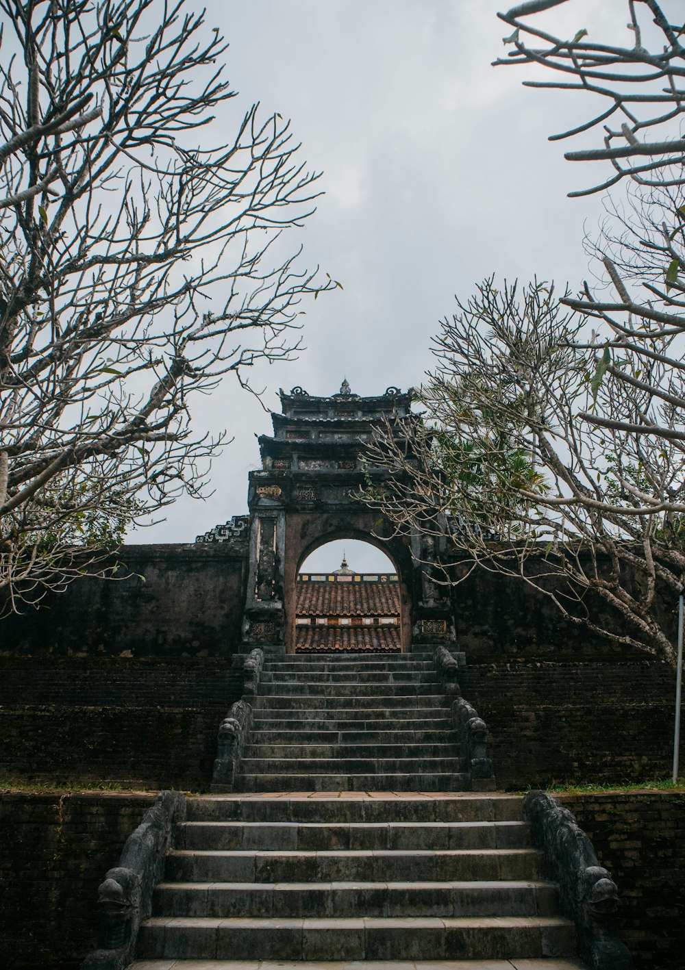 a set of stairs leading up to a gate