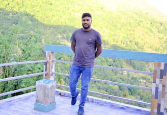 Smiling guest enjoying a peaceful moment on a balcony overlooking Lavras city.