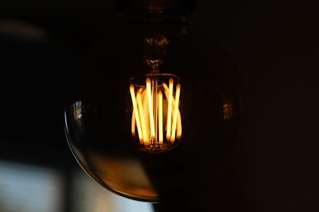 a light bulb that is turned on in the dark