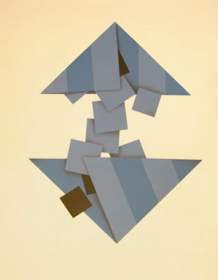 A serene puzzle game scene showing interlocking shapes and calming blue tones.