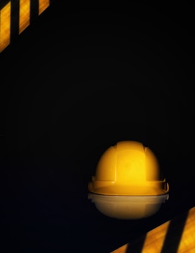 Close-up of a vibrant decal on a contractor's hard hat.