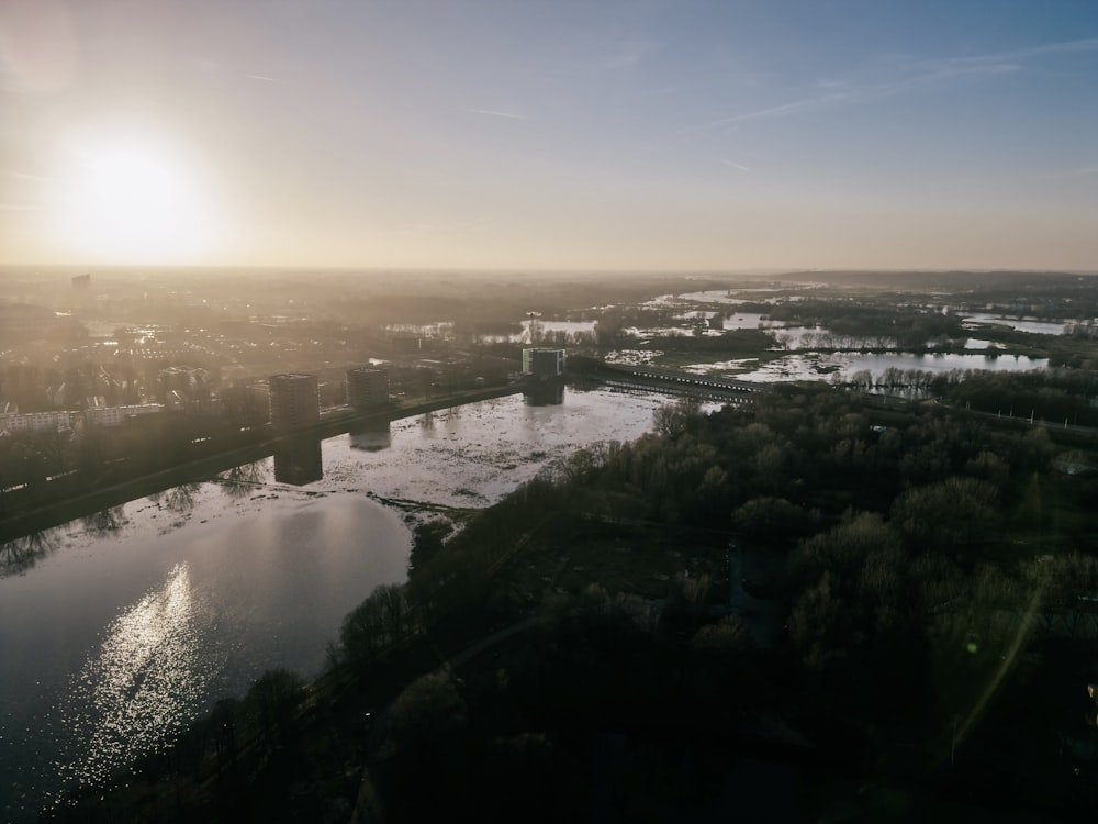 an aerial view of a river and a city