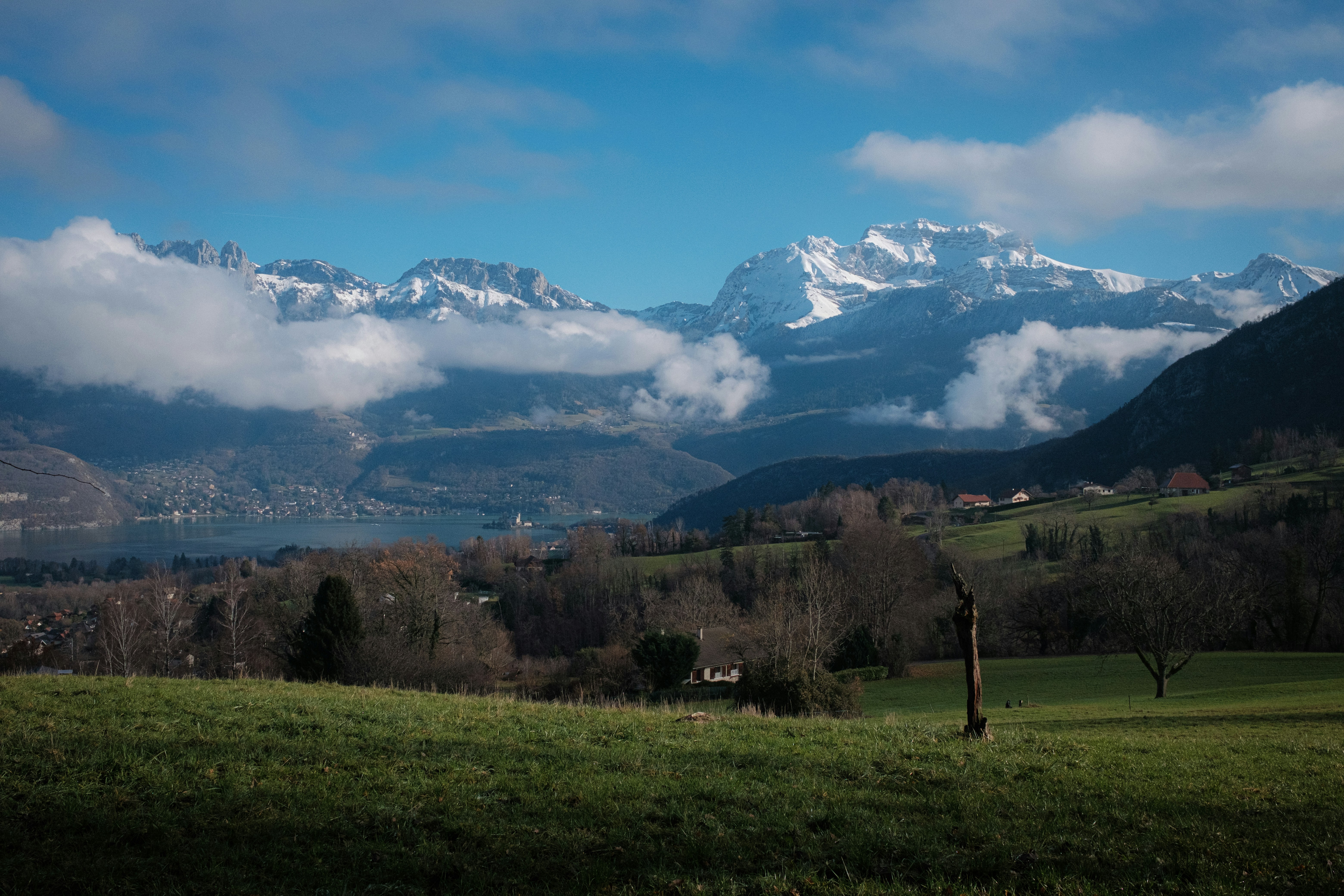 a view of a valley with mountains in the background