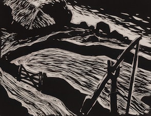 A monochromatic illustration featuring a dynamic composition with curved and sharp lines. It includes abstract forms that resemble a river or stream flowing past angular and curved structures, possibly rocks or hills, with a prominent object resembling a wooden bridge or structure.