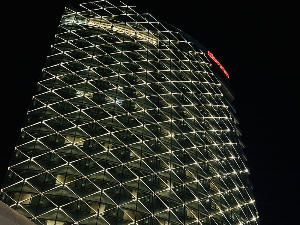 a very tall building lit up at night