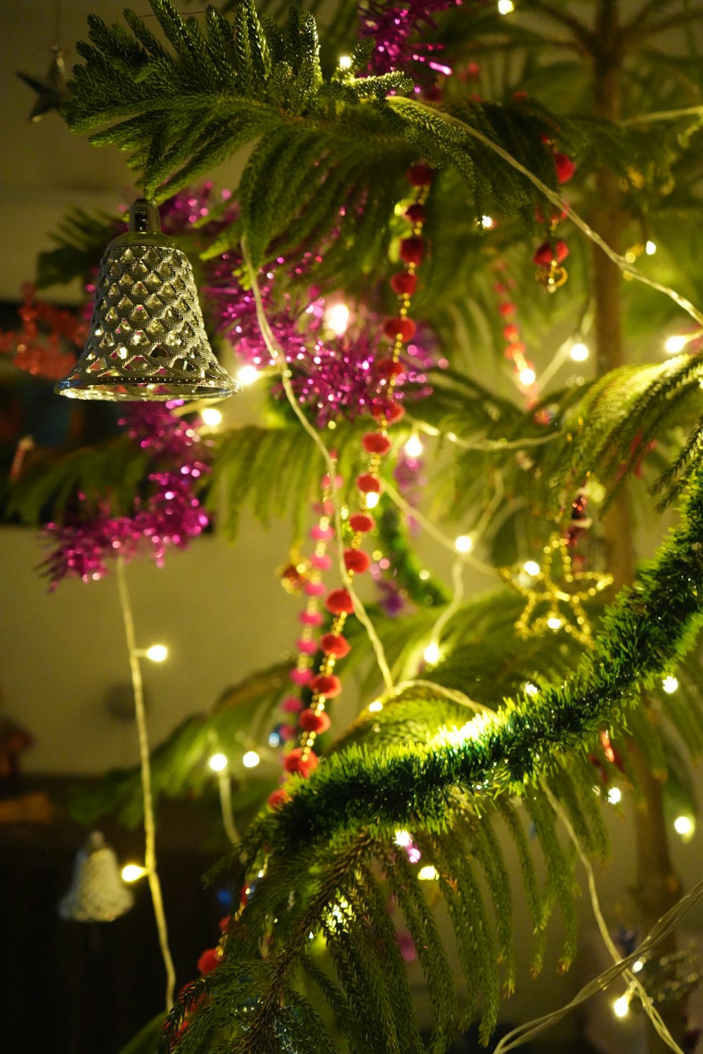 a close up of a christmas tree with lights