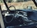 the interior of a car with a steering wheel and dashboard