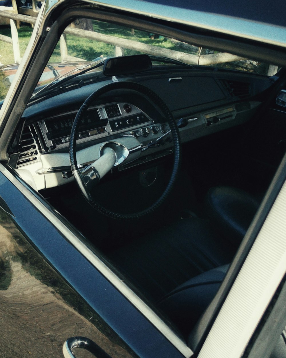 the interior of a car with a steering wheel