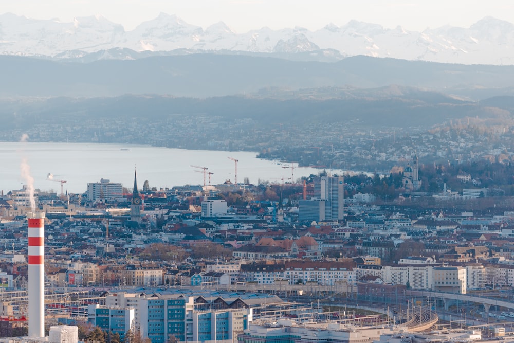 a view of a city with mountains in the background