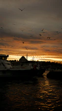 A beautiful waterfront property in Kadıköy with a sunset view.