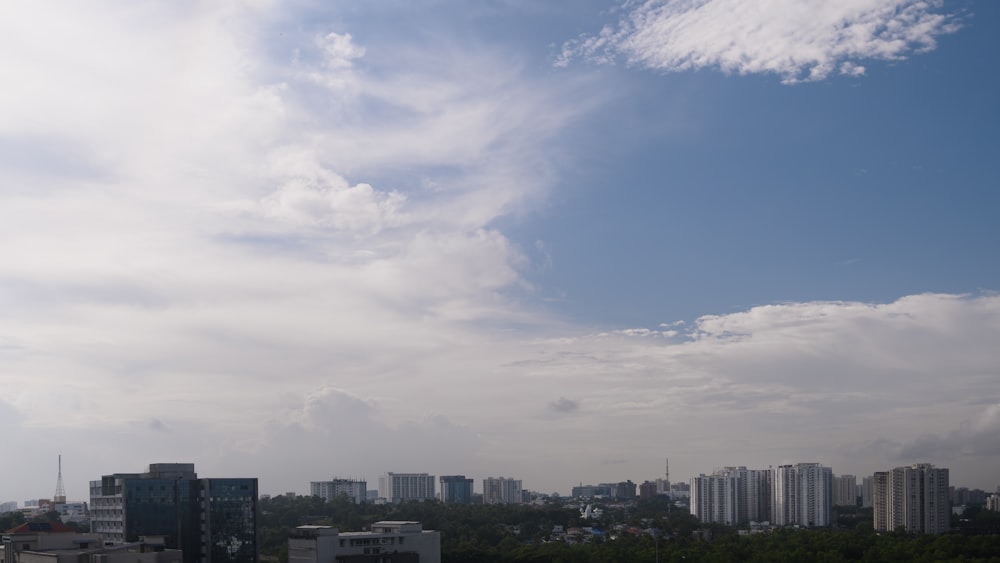 a view of a city with tall buildings