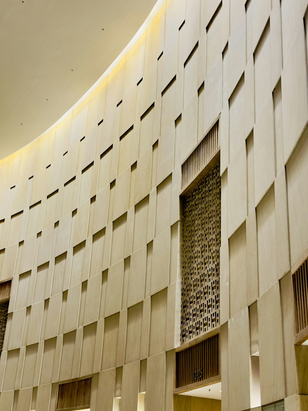 the inside of a building with a clock on the wall