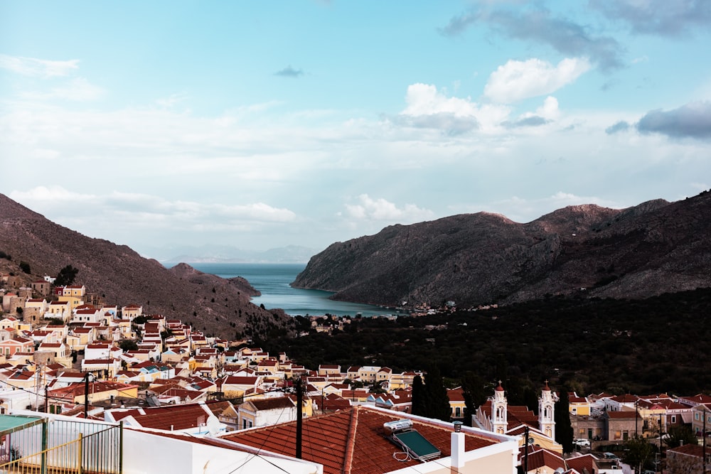 a view of a city with mountains in the background