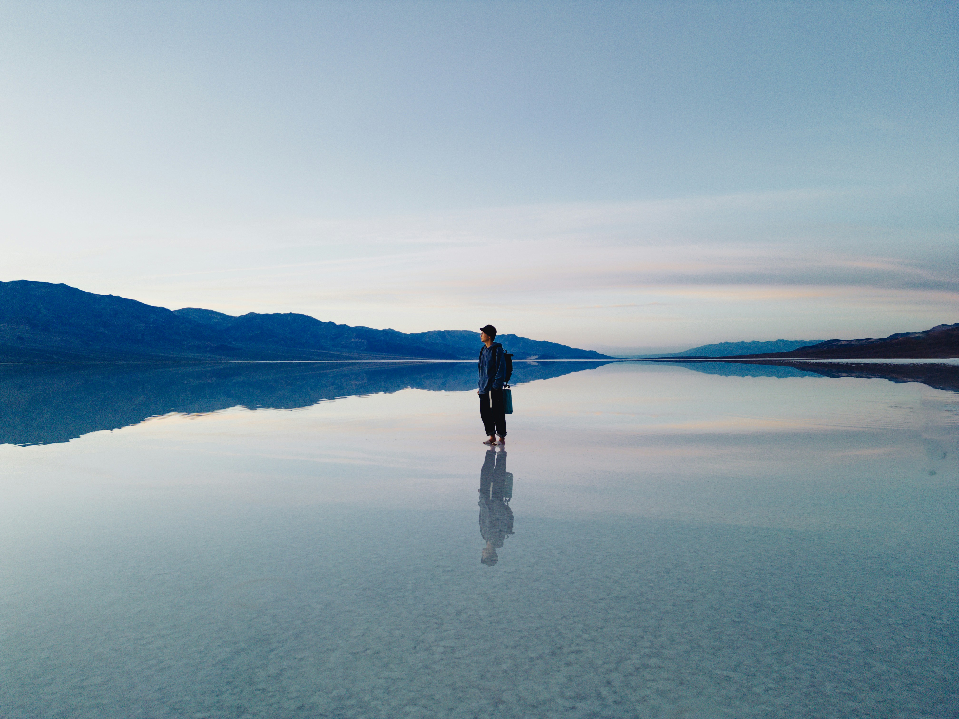 a person standing on a large body of water