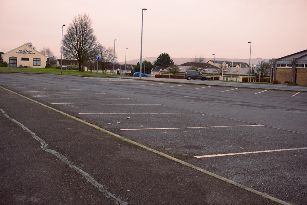 a empty parking lot in a residential area