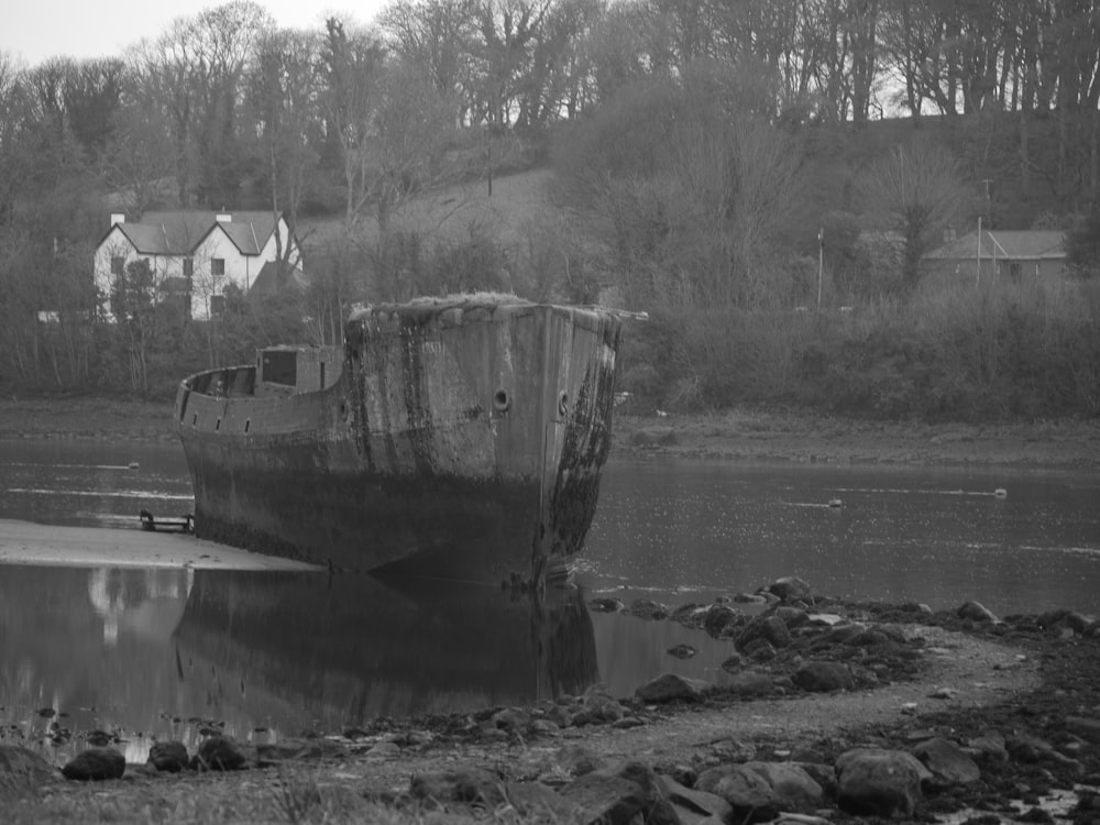 a boat sitting on top of a body of water