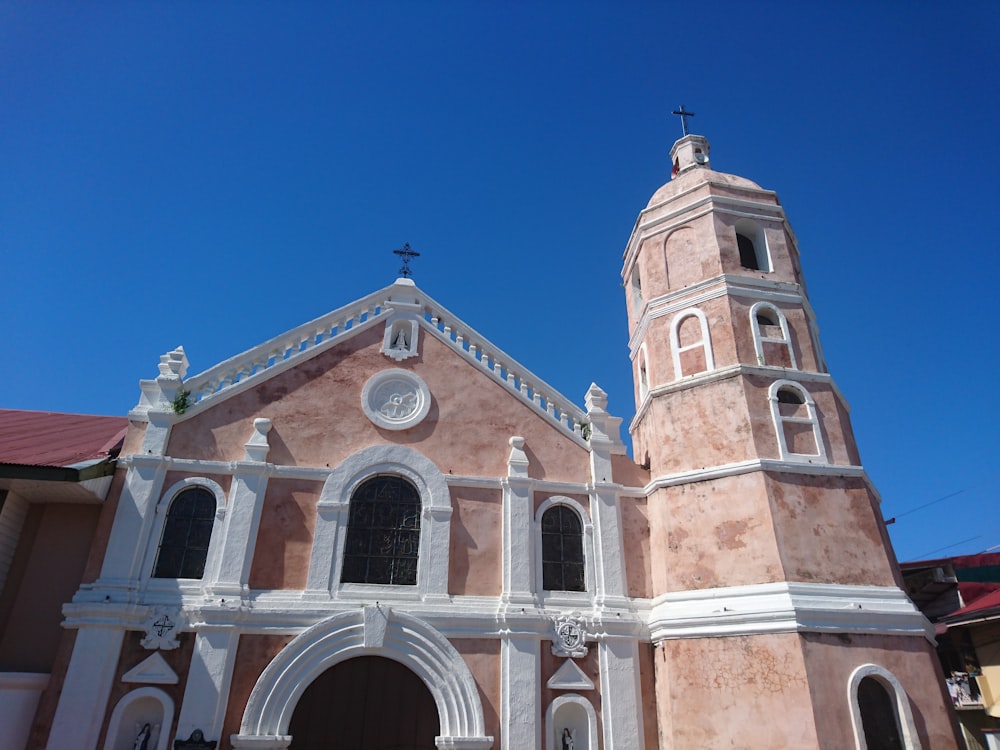 an old church with a steeple and a bell tower