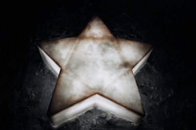 A shining star icon representing the Premium pricing plan.