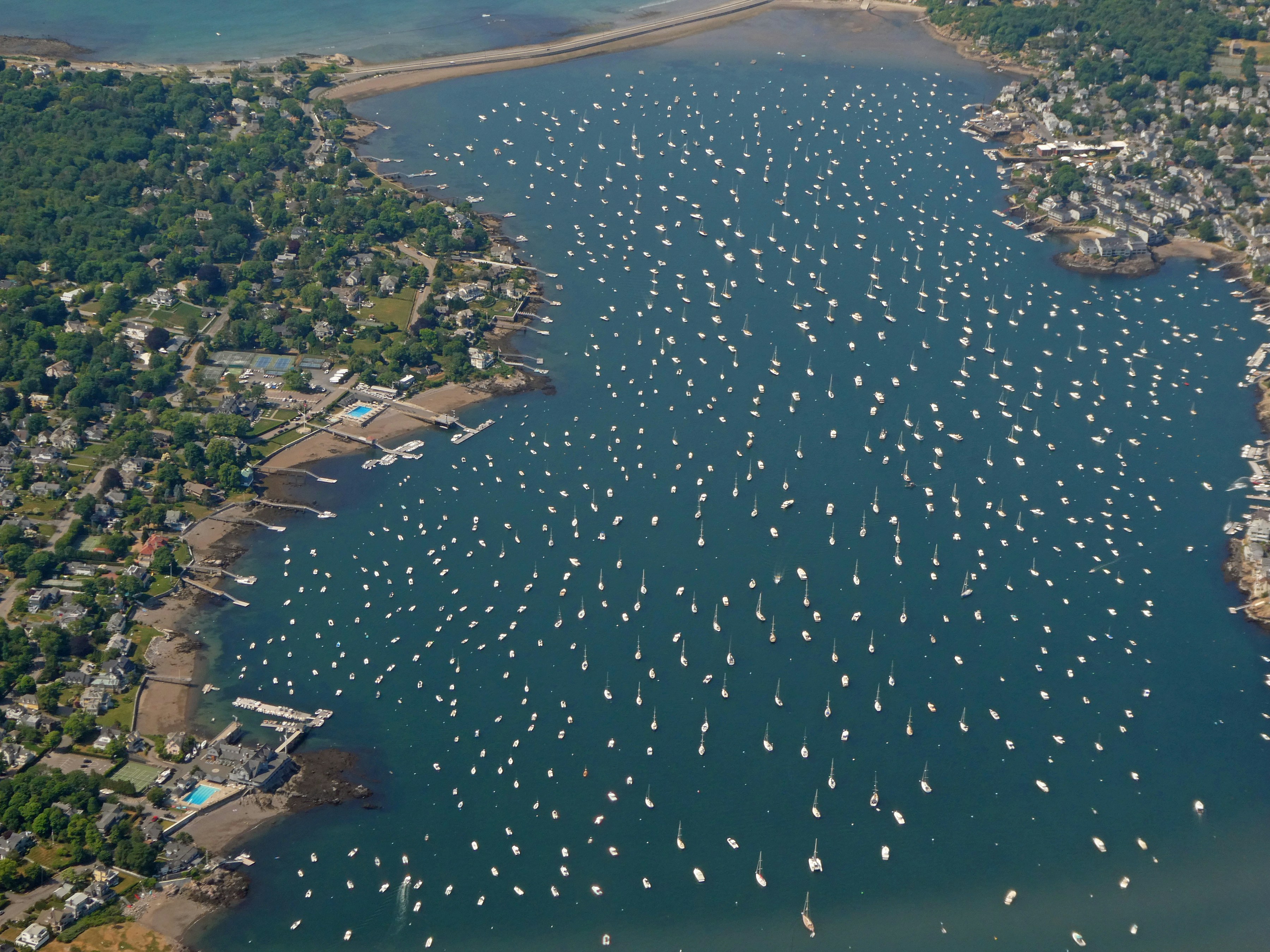 An aerial view of a busy Lake Lewisville with many boats enjoying the water - Boating Lifestyle Dallas and North Texas