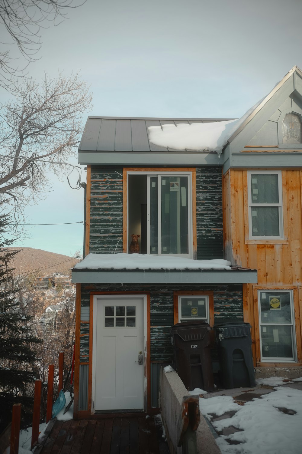 a house that has a lot of snow on it