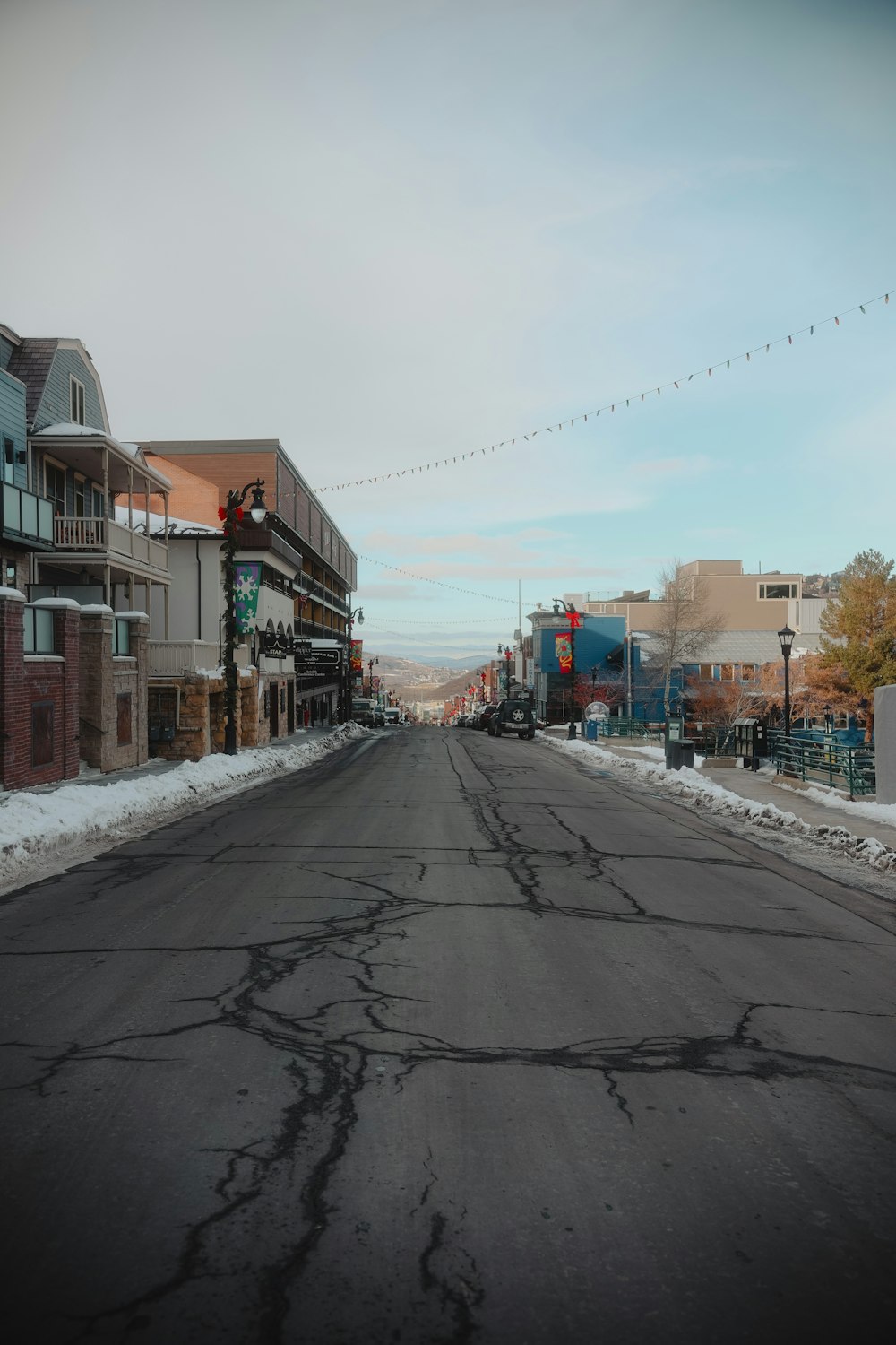 an empty street with buildings on both sides of it